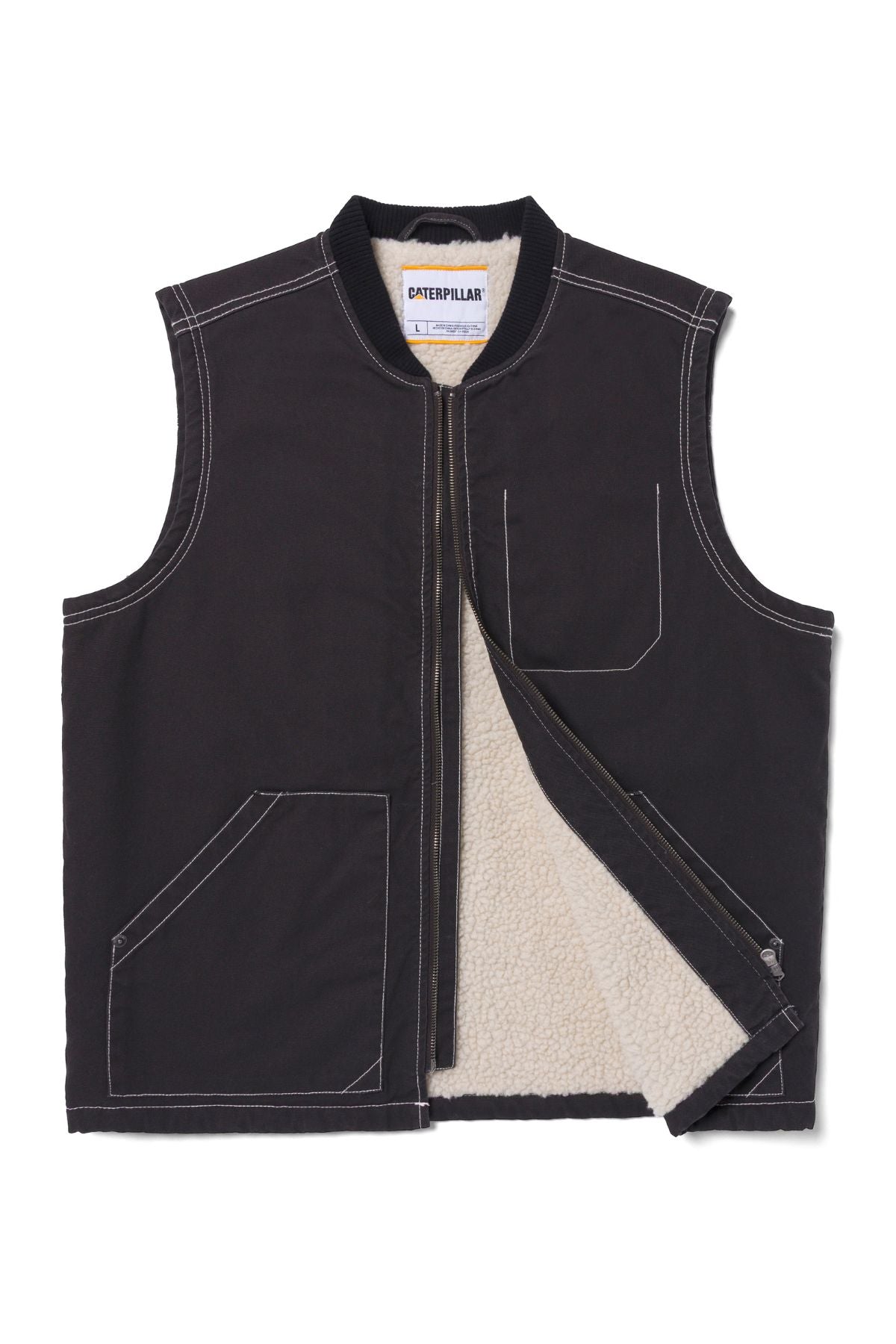 The CAT Canvas Utility Sherpa Lined Vest is black, sleeveless, with white stitching, a zip front, two large front pockets, one chest pocket, and visible cream-colored Sherpa lining shown partially unzipped.