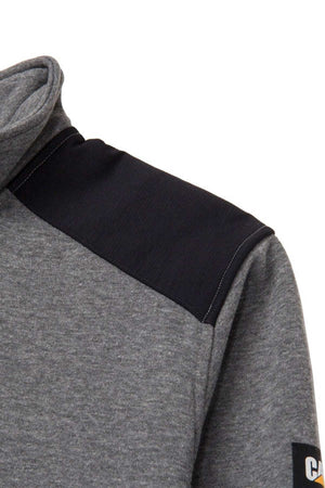 Close-up of the CAT Essential 1/4 Zip Sweatshirt, showcasing its grey design complemented by nylon shoulder overlays. It features a high collar and a visible sleeve adorned with a logo patch at the end. The fabric looks exceptionally soft and comfortable, making it ideal for everyday wear.