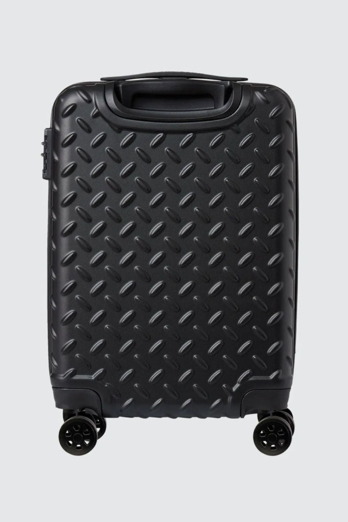 The CAT Industrial Plate 20" Trolley, a black hard-shell carry-on with a diamond plate pattern, four wheels, and a recessed handle, stands upright against a plain light gray background.