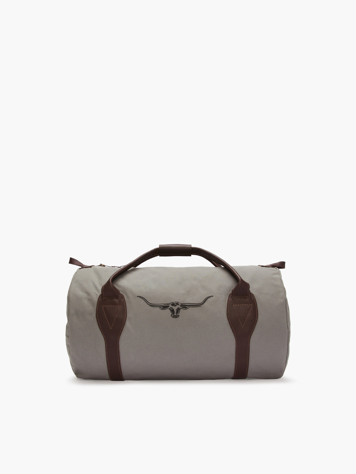 The RM Williams Canvas Ute Bag is a gray duffle with brown leather handles, utility canvas material, and features a longhorn logo. Its water resistance makes it both stylish and practical.