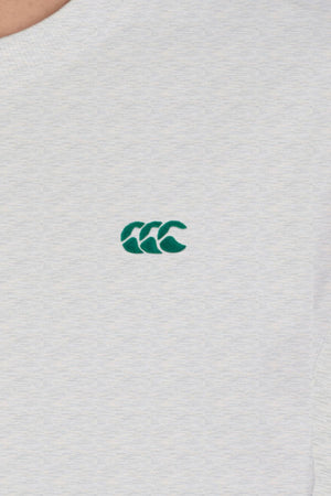 A close-up of the Canterbury CCC Collection T-Shirt in light grey, showcasing a small green embroidered triple "C" logo on the chest and an oversized fit for extra comfort.