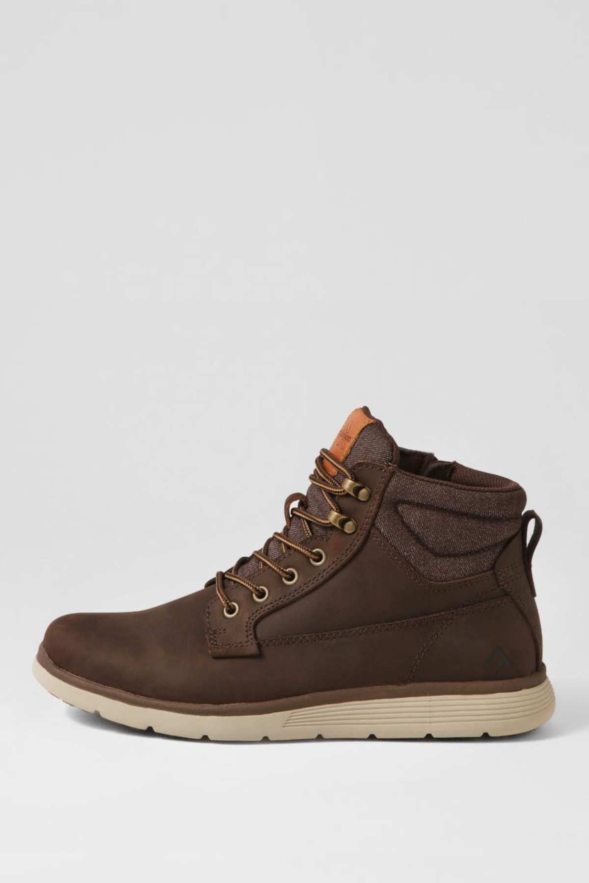 The Colorado Yrbud Boot is a brown leather ankle boot featuring tan laces, metal eyelets, a padded collar, and a beige slip-resistant rubber sole, shown in profile on a plain light background.