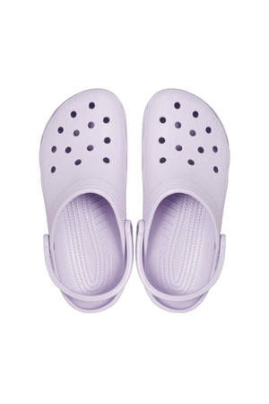 A pair of Crocs Classic Clog in light purple is shown from above, highlighting the breathable ventilation holes on the upper and forward-positioned heel straps. These lightweight shoes offer a textured insole for added comfort.