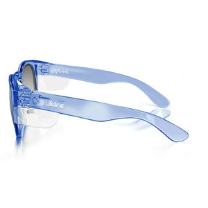 SafeStyle Cruisers Blue Frame Tinted Lens safety glasses, shown from the side, feature a modern translucent blue frame with tinted polycarbonate lenses. "Lifeline" is printed in white on the temple arm. The glasses rest on a white surface.