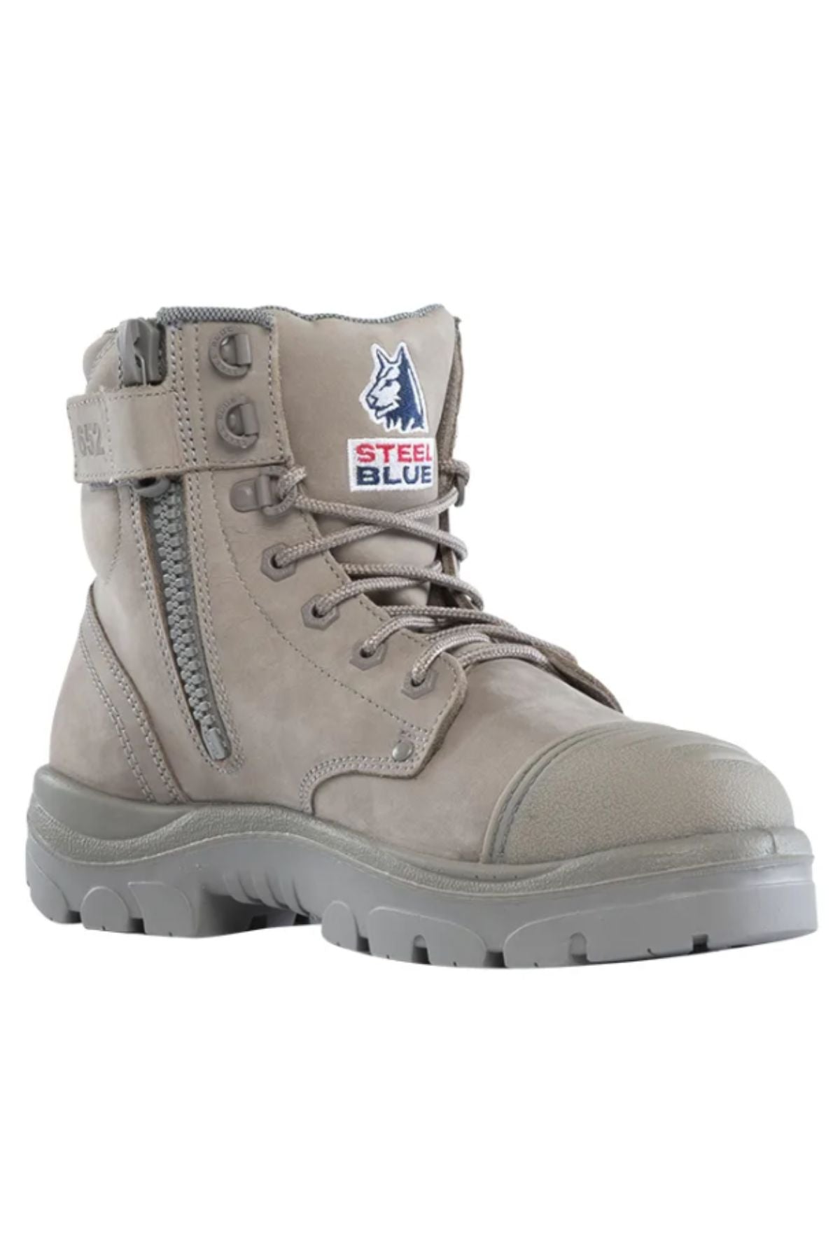 The Steel Blue Argyle Zip Scuff Cap Boot is a gray boot with side zipper, laces, steel safety toe, rugged sole, and a wolf patch labeled "STEEL BLUE"—built for tough jobs and trusted for quality in construction.