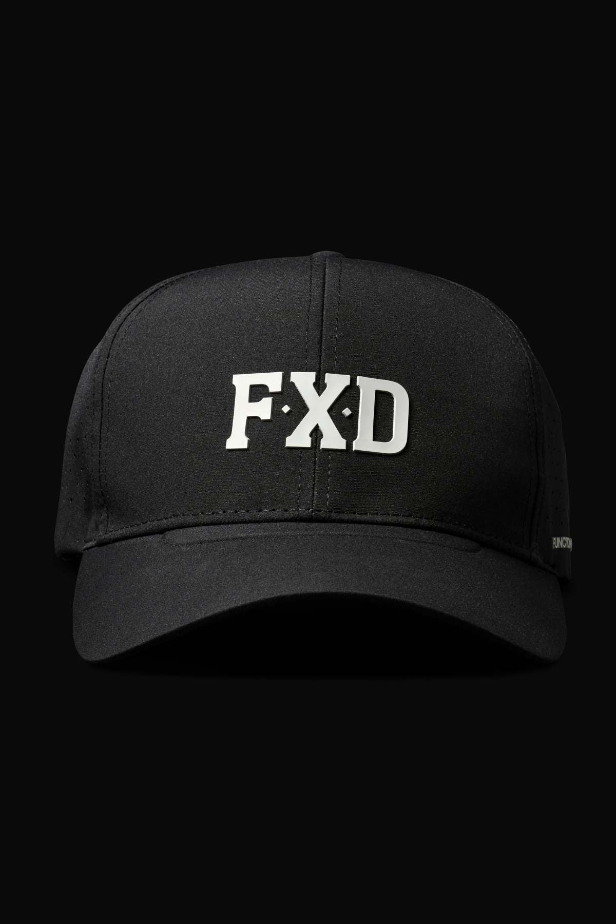 The FXD CP-12 Tech Baseball Cap, designed with quick-drying performance polyester, showcases "FXD" in bold white on the front. Its lightweight build ensures comfort and a modern look against a dark background.