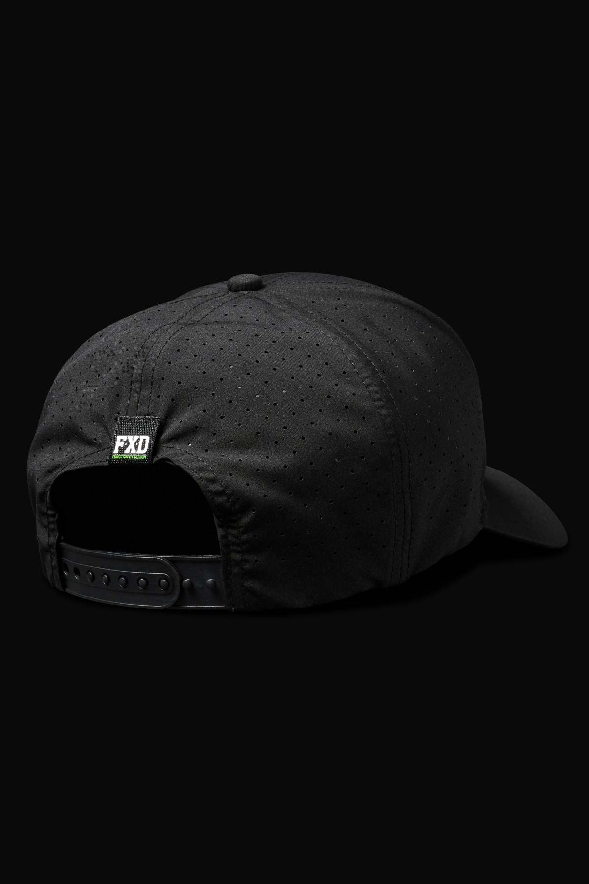 The back view of the FXD CP-12 Tech Baseball Cap highlights its lightweight design, small ventilation perforations, quick-drying performance polyester material, adjustable snap strap, and a subtle "FXD" logo tag against a solid black background.
