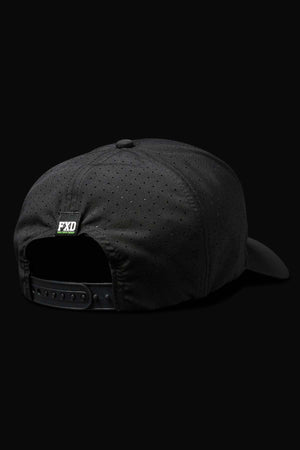 The back view of the FXD CP-12 Tech Baseball Cap highlights its lightweight design, small ventilation perforations, quick-drying performance polyester material, adjustable snap strap, and a subtle "FXD" logo tag against a solid black background.