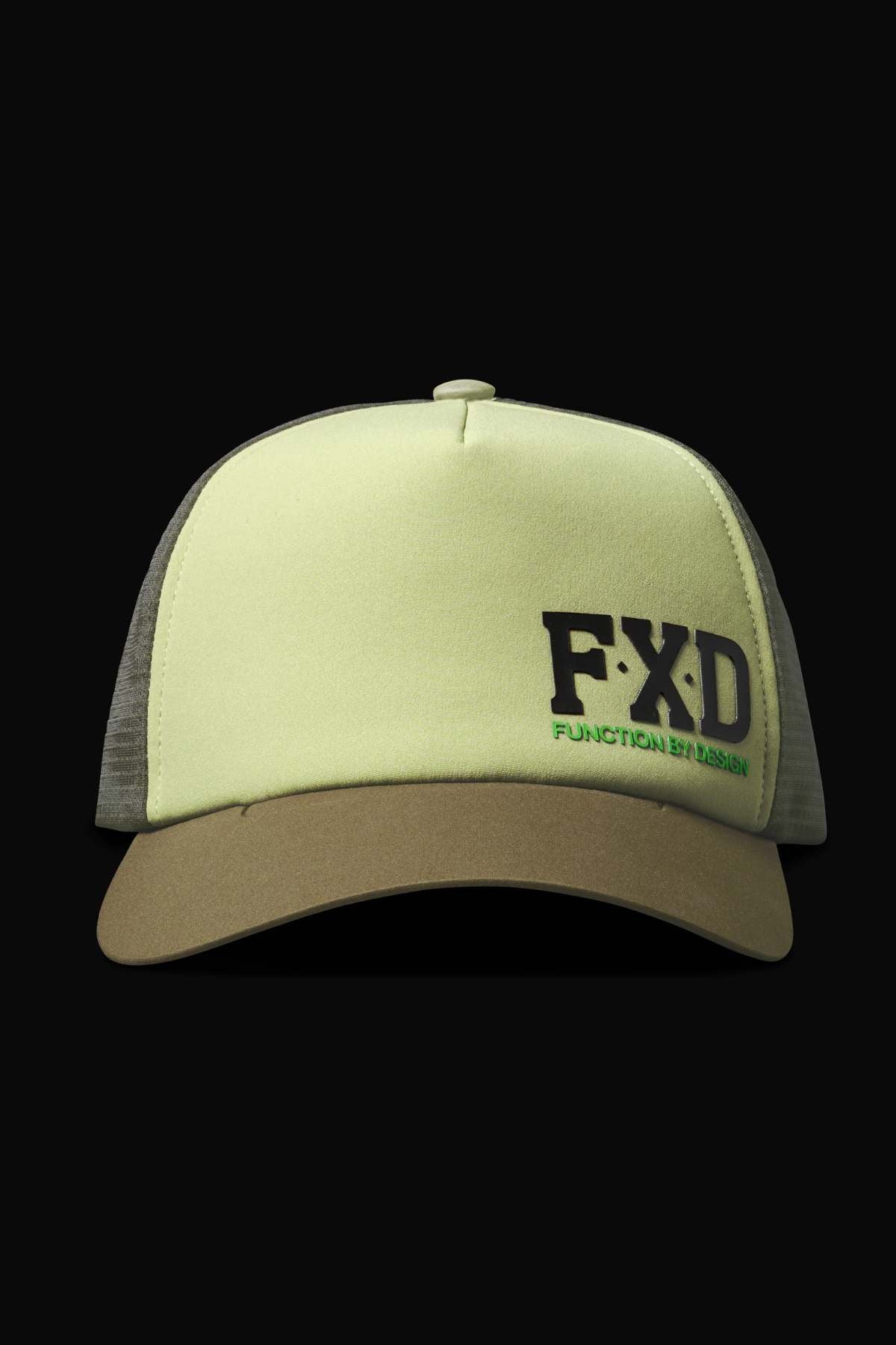 The FXD CP-13 Trucker Cap features a yellow and gray design with a breathable mesh back, black "FXD" logo, green "Function by Design" text on the front, brown brim, and an adjustable snap-back closure.