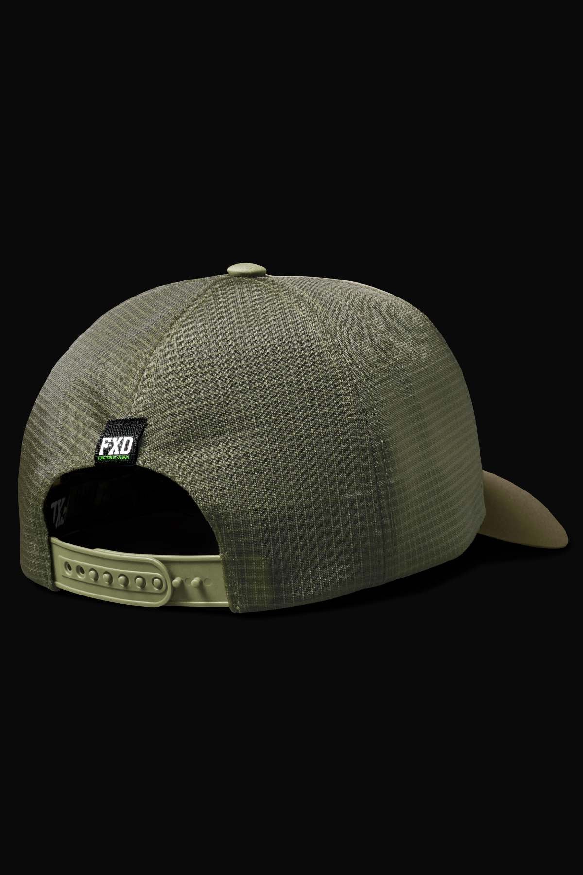 The FXD CP-13 Trucker Cap in khaki green features a grid pattern, breathable fabric, an adjustable snap-back strap, and a black FXD logo tag above the back opening. Displayed from the back against a solid black background.