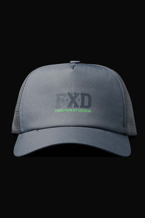 The FXD CP-13 Trucker Cap is grey with black mesh sides, made from breathable material. It features "FXD" in black and "FUNCTION BY DESIGN" in green on the front, plus an adjustable snap-back, shown against a black background.