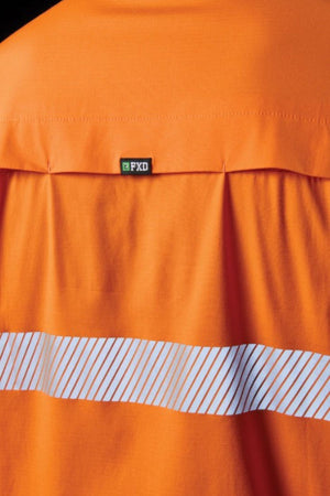 The image shows the back of the FXD LSH-4T Work Shirt in orange, featuring durable stretch fabric, a horizontal white reflective stripe, and a small black and green "FXD" tag near the upper back.