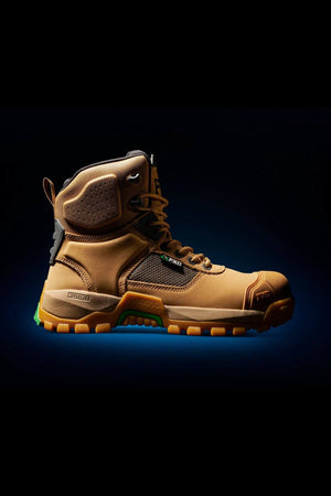 The FXD WB-1 Work Boot is a rugged brown footwear option that features bold orange accents and a high ankle for enhanced support, showcased against a dark background. This slip-resistant boot offers a sturdy sole and a reinforced safety toe, making it perfect for durability and heavy-duty use.