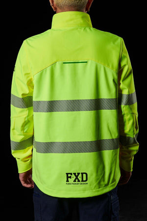 Against a black background, a person wears the FXD WO-3T Hi Vis Soft Shell Work Jacket in neon yellow with silver reflective stripes. The wind and water-resistant design features bold "FXD" lettering at the bottom, ensuring high visibility and reliability.
