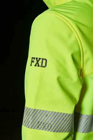 Close-up of the FXD WO-3T Hi Vis Soft Shell Work Jacket, highlighting its high-visibility yellow design with reflective grey stripes on the sleeve. The black "FXD" text is printed above, emphasizing its wind and water-resistant features against a dark background.