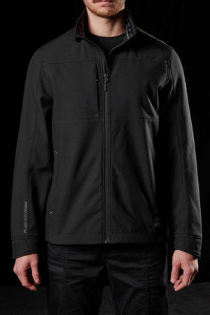 Someone is wearing the stylish black FXD WO-3 Soft Shell Work Jacket, featuring a zip-up front, high collar, and breathable wind and water-resistant fabric with subtle stitching. The dark color highlights its details, offering both style and practicality.