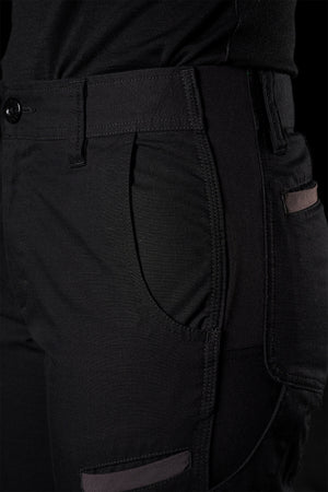 Close-up of a person wearing black FXD Womens WP-8W pants. The image focuses on the side pocket and waistband area, highlighting the precise stitching and fabric texture. The lightweight stretch ripstop material appears to be durable, possibly designed for outdoor or tactical use.
