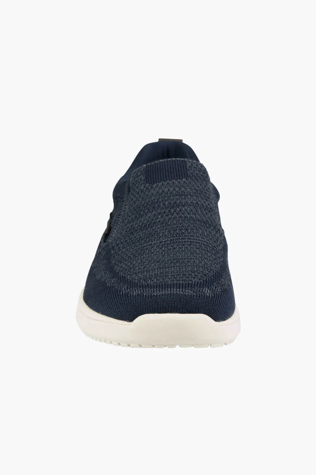 Front view of the Florsheim Conway Knit Moc Toe Slip On in navy blue, featuring a Softgel heel pod and white sole, shown against a plain white background.