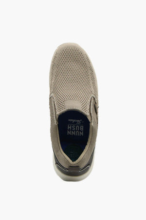Top view of the Florsheim Conway Knit Moc Toe Slip On in beige, featuring a breathable mesh upper, memory foam insole, and lightweight EVA/rubber outsole for comfort. Positioned on a plain white background.