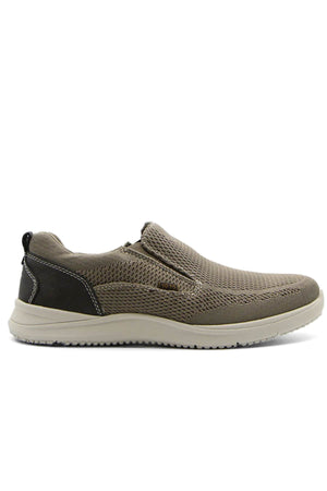 The Florsheim Conway Knit Moc Toe Slip On is a taupe mesh slip-on sneaker with white stitching, a black heel accent, and a white EVA/rubber outsole, shown from the side.