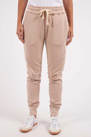Foxwood Simplified Pant - Oatmeal. Front facing image of pants on model