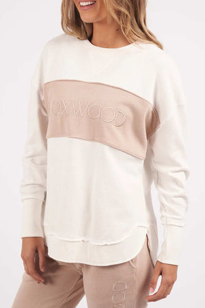 Foxwood Simplified Tonal Crew - Vintage White. Side facing image of jumper on model.