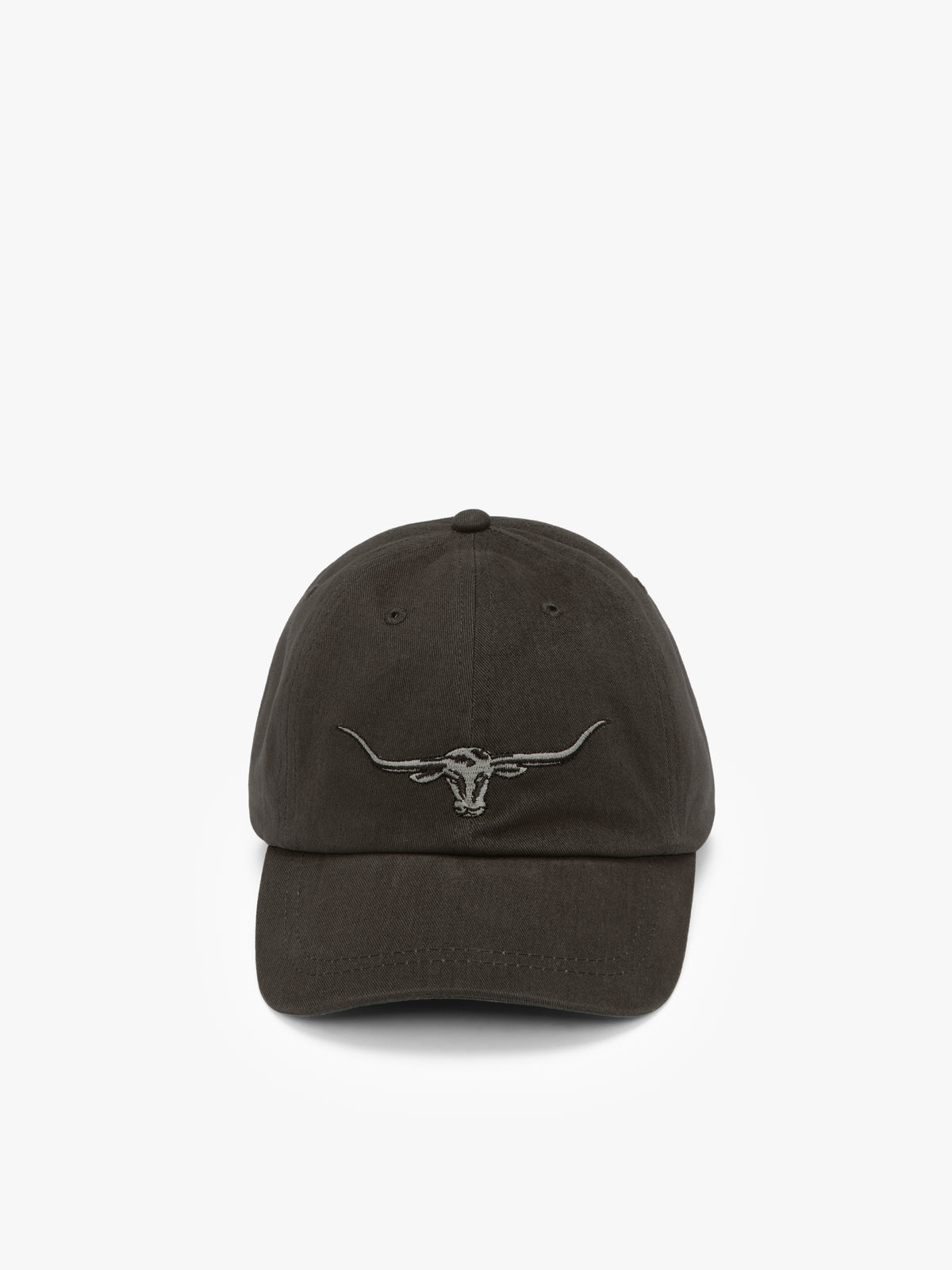 The RM Williams Longhorn Cap is a black cotton twill hat featuring an embroidered longhorn skull logo on the front, shown against a plain white background.