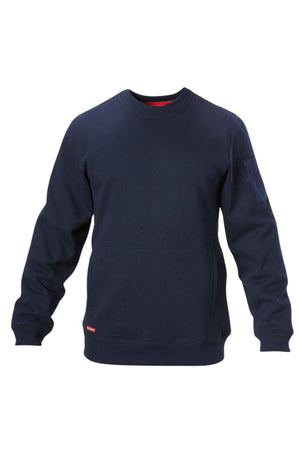 The Hard Yakka Plain Fleece Crew is dark blue with long sleeves and a small red logo tag near the hem. Made from soft, comfortable fabric, it features a minimalist design with no extra patterns or graphics.