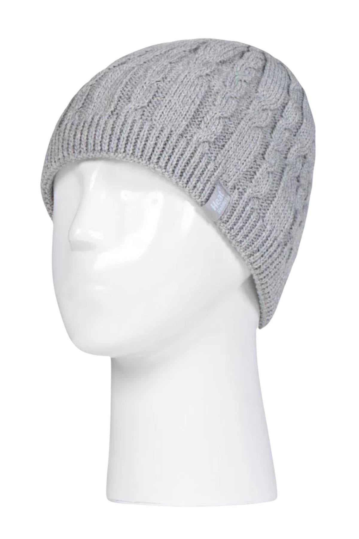 The Heat Holders Alesund Ladies Thermal Beanie, a gray cable-knit hat with insulation lining, is displayed on a white mannequin head from the side against a plain white background.
