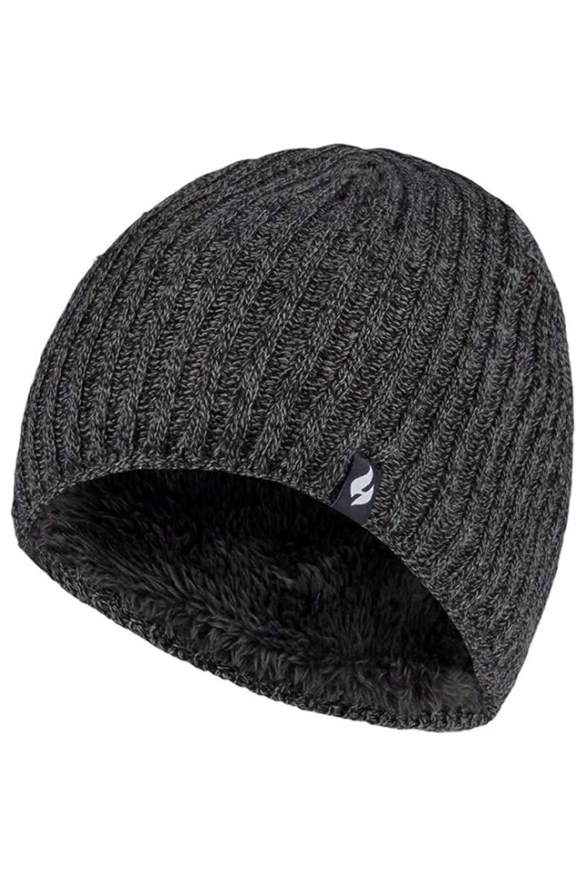 The Heat Holders Halden Men's Thermal Beanie is a dark gray, ribbed knit beanie featuring a small logo tag on the side. Its interior boasts thick and black HeatWeaver thermal lining, which appears warm and fuzzy. With its simple and versatile design, this beanie is ideal for cold weather and outdoor winter activities.