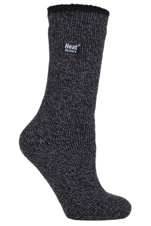 A single dark grey, mid-calf sock with a textured knit pattern is shown. The sock, boasting a high TOG rating for exceptional warmth, has a label that reads "Heat Holders" near the top. This product is named Heat Holders Ladies Wool Sock.