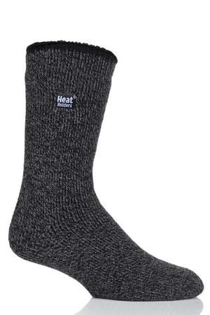 The Heat Holders Mens Wool Sock, a thick dark gray thermal wool sock with a label, is displayed upright against a white background—ideal for outdoor use.