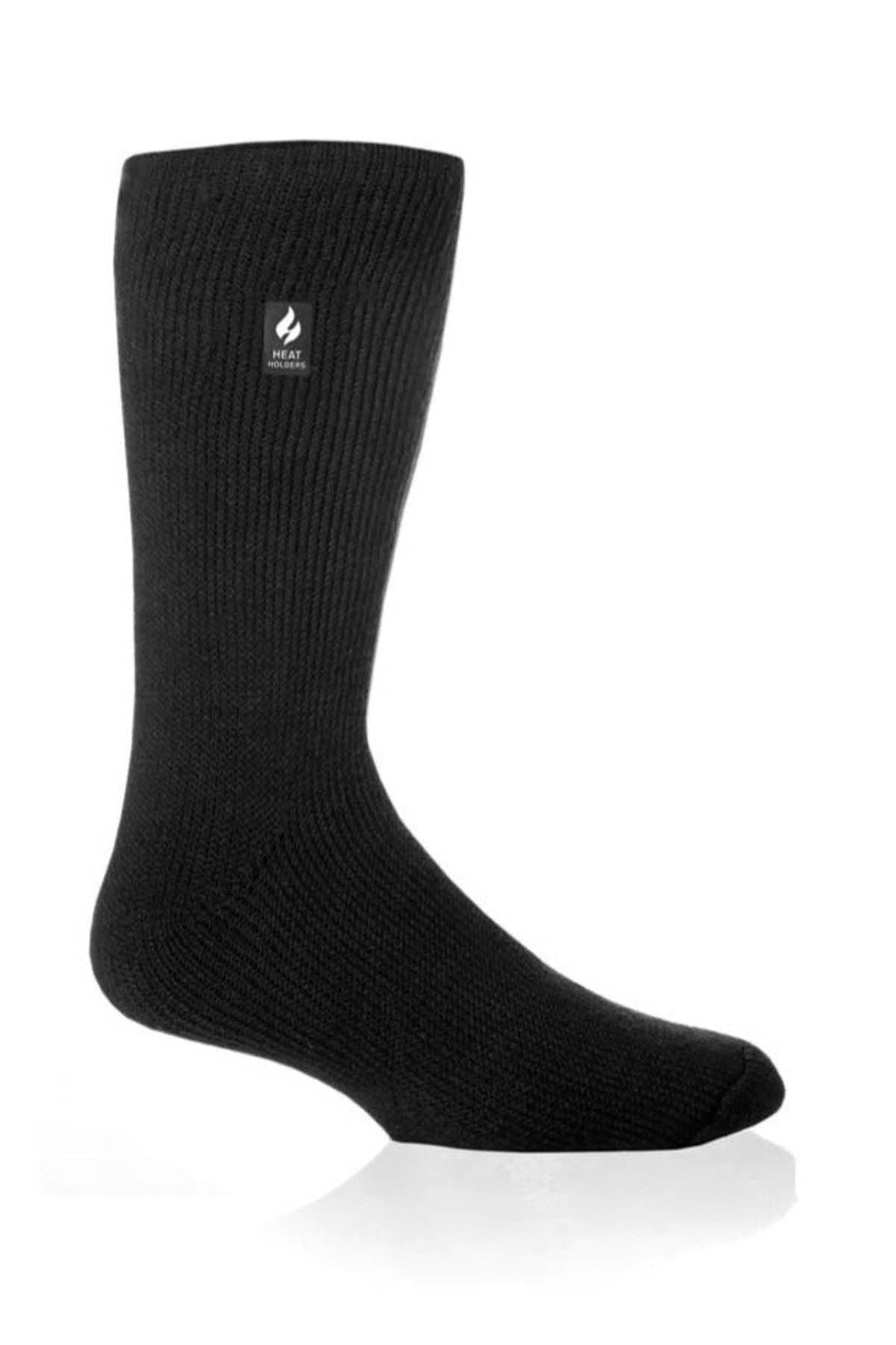 A single Original Thermal Heat Holders sock in black is displayed against a white background. This medium-length, ribbed sock features a small square logo near the top that displays a flame icon and the word "HEAT." The thick fabric suggests it is designed to provide warmth in cold weather.