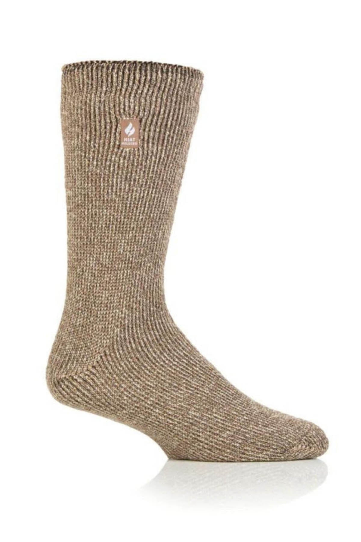 An Original Thermal Heat Holders Sock, extending to mid-calf length and featuring a rich brown hue, is showcased against a pristine white background. The wool sock displays a ribbed texture and includes a small label near the top bearing a flame icon and text. With an impressive TOG rating of 2.3, it ensures exceptional winter warmth with its reinforced heel and toe sections.