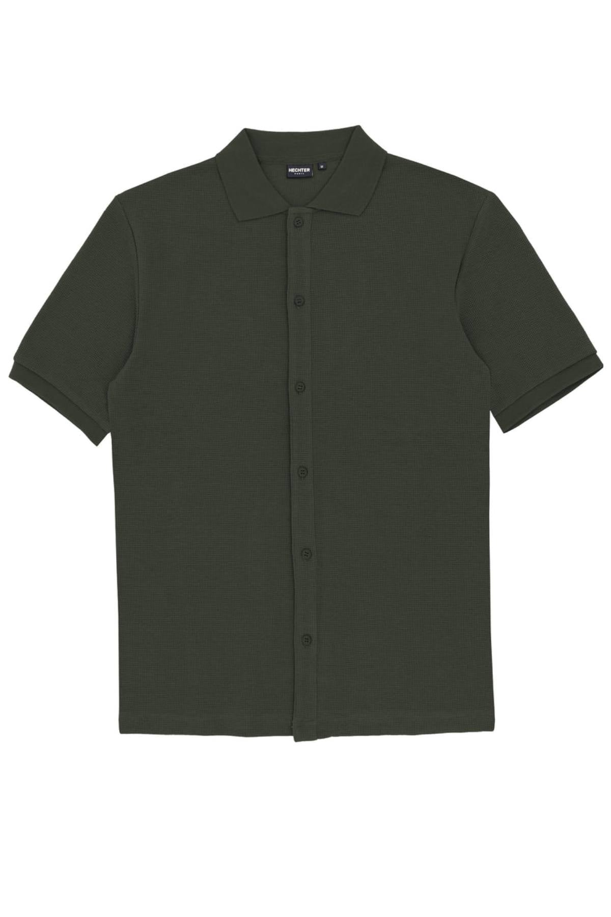 The Hechter Sheen Textured Cotton Blend Short Sleeve Shirt in dark green features a collared design and textured fabric, shown laid flat on a white background.