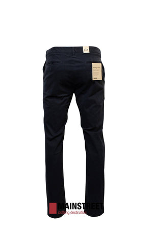 Rear view of Howard Hudson Brunswick Stretch Chino Pant with tags on a white background. Made from cotton elastane for a modern fit, with "MAINSTREET clothing destination" visible at the bottom.