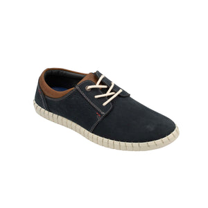 The Colorado Texan Shoe is a casual dark green men's sneaker made with nubuck leather, featuring white laces, brown trim, a textured white sole, and a memory foam footbed for comfort and style. It's showcased on a clean white background.