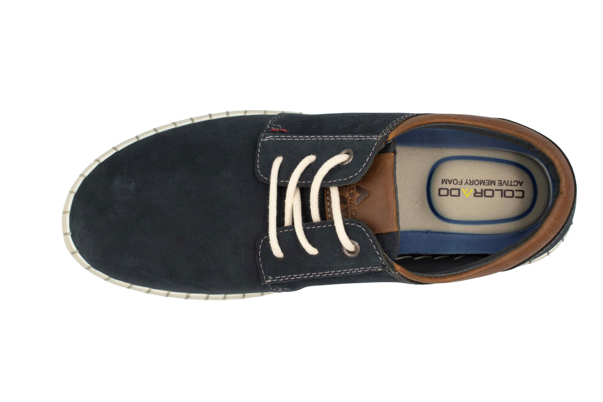 Top view of the Colorado Texan Shoe, a dark green versatile sneaker with white laces, light brown accents, and a light sole. Crafted from nubuck leather, it features "COLORADO ACTIVE MEMORY FOAM" insoles for supreme comfort.