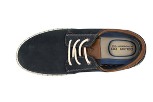 Top view of the Colorado Texan Shoe, a dark green versatile sneaker with white laces, light brown accents, and a light sole. Crafted from nubuck leather, it features "COLORADO ACTIVE MEMORY FOAM" insoles for supreme comfort.