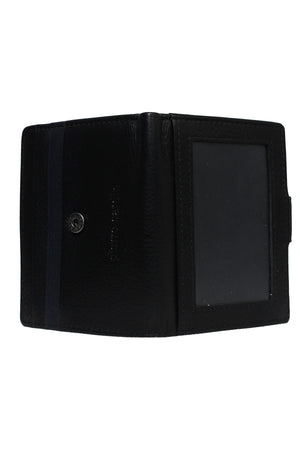 The Pierre Cardin Wallet, made of genuine black leather, is open on a white background. It features an ID slot with a clear window on the right and multiple card slots on the left. The wallet appears empty.