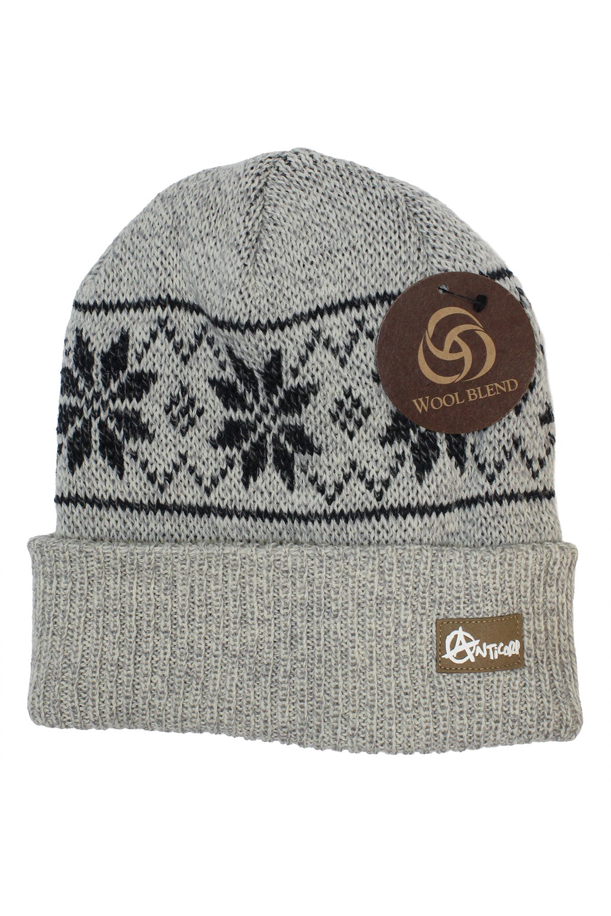 The Anticorp Pattern Beanie features a gray knit, black snowflake design, folded cuff, small brown label, and a "Wool Blend" tag—making it the perfect cozy winter beanie for chilly days.
