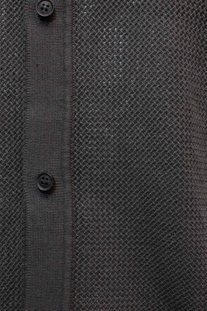 Close-up of the Industrie The Nanterre Short Sleeve Shirt in dark gray textured knit, showcasing a left-side button placket with two black buttons—ideal for relaxed casual style.