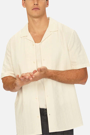 Industrie the Viana Short sleeve shirt - Closeup view of man modelling tis shirt with a singlet underneath and wearing the shirt open