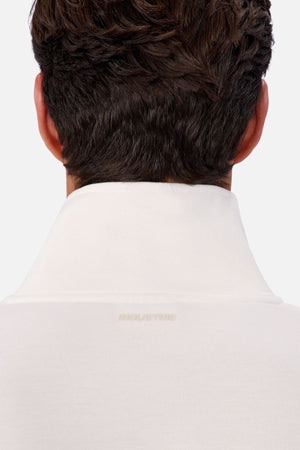 A person with short dark hair is shown from behind, wearing the Industrie The Tech Southend Track Top in white, which features subtle text on the back of the collar for a casual look.