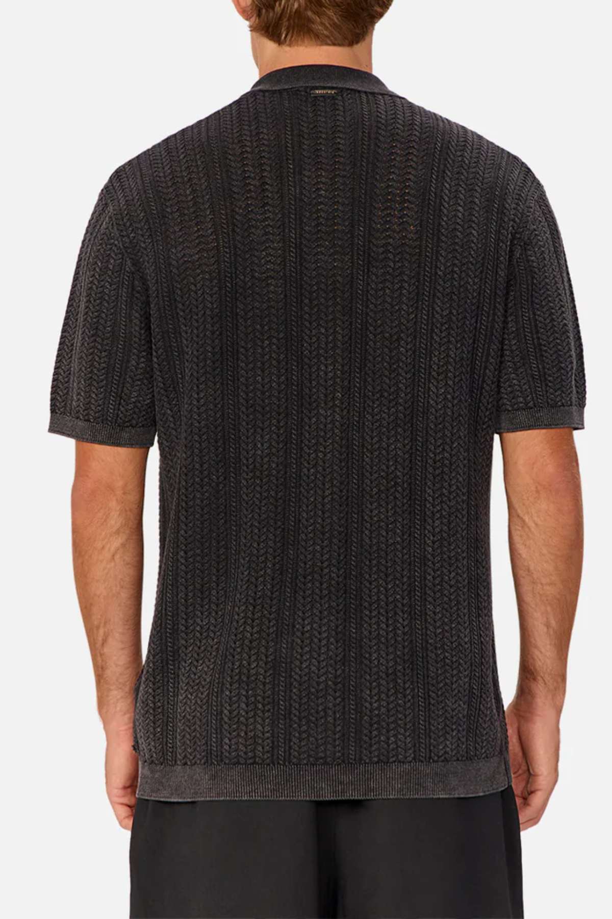 Industrie the Alessio Shirt in colour washed black - a button up shirt with collar modelled with black trousers - back view