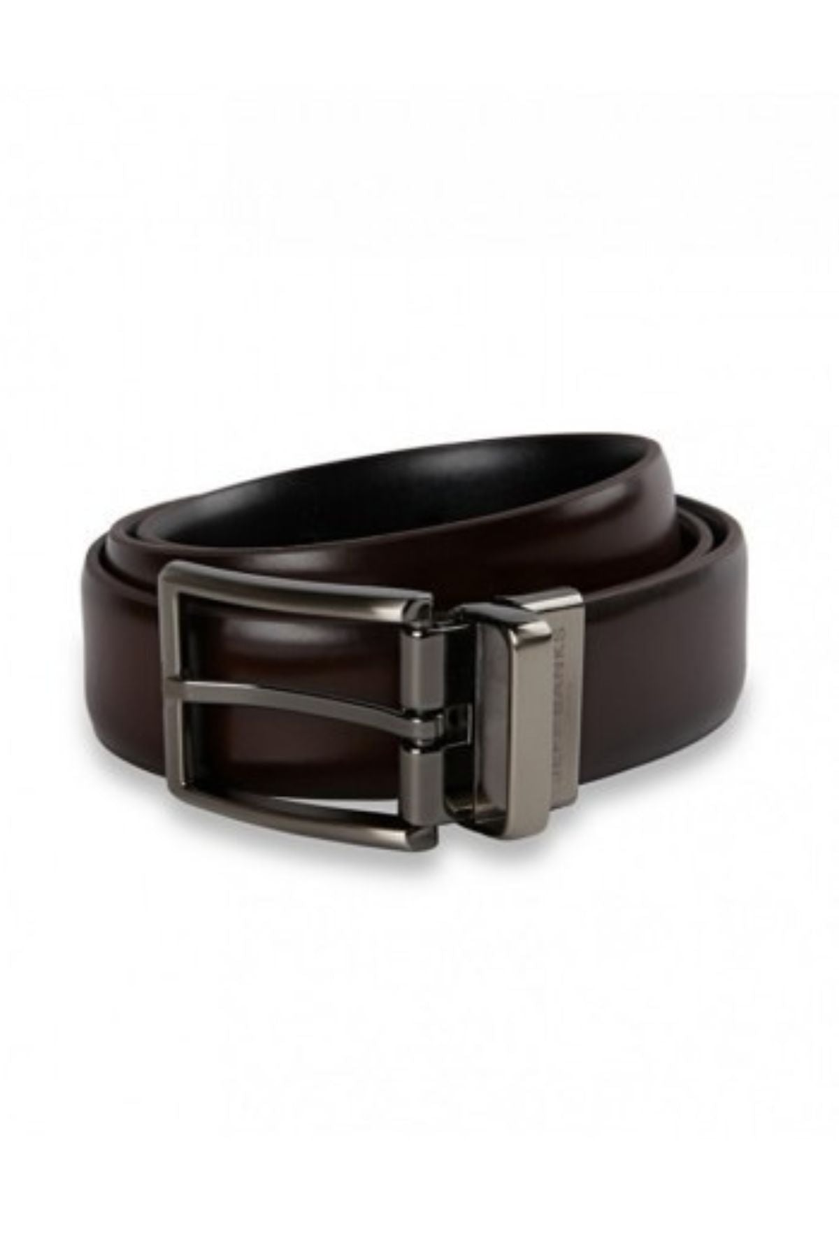 The Jeff Banks Reversible Pin Buckle Belt, crafted from genuine dark brown leather with a polished gunmetal-tone buckle, is shown rolled up on a white background.