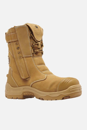 The King Gee Bennu Pro 9 Work Boot is tan, mid-calf with a steel toe, reinforced sole, padded ankle support, side zipper with Velcro strap, and a slip-resistant outsole for durability and safety.