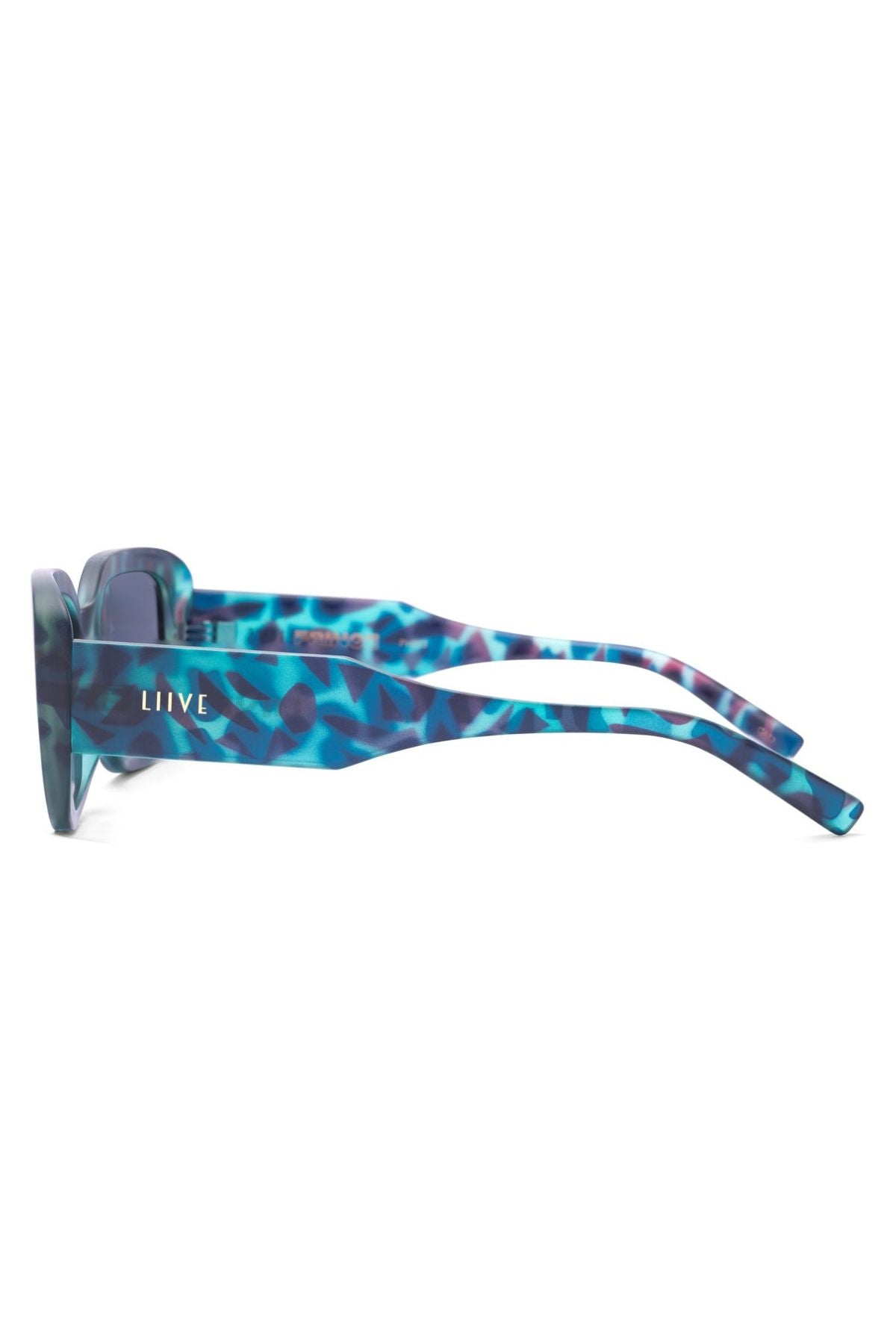 Side view of Liive Fringe Blue Meanie Sunglasses showcasing a multicolored blue and purple marbled finish with 90s-inspired rectangular frames. "LIIVE" is printed in white on the arm near the hinge.