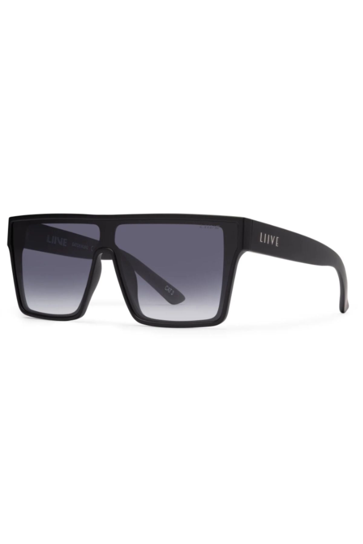 Liive Wasteland Sunglasses feature a bold black rectangular shape with thick frames, dark gradient lenses, and “LIIVE” branding on the left temple. The oversized flat-top design creates a modern statement look.