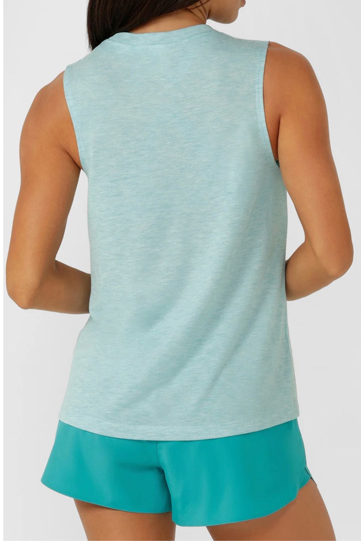 A person is shown from the back wearing the Lorna Jane Lotus Muscle Tank in light blue and teal shorts against a plain, light-colored background.